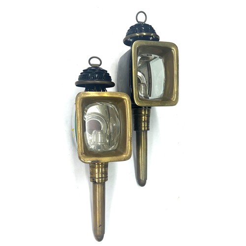 1283 - Pair of 19th century coaching lamps, black japanned and brass with bevelled glazed plates, 17.5