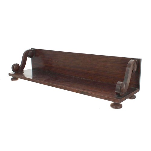 1158 - 19th century rosewood book holder, with scroll end supports and bun feet, 20.75” wide, 5.25” high... 