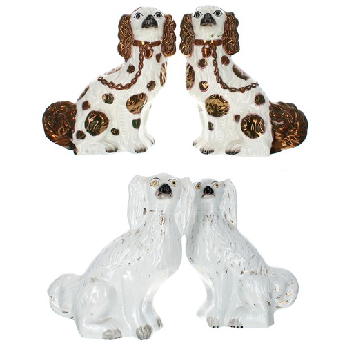 1561 - Pair of Victorian Staffordshire pottery spaniels, with copper lustre coats, 12.5” high; together wit... 