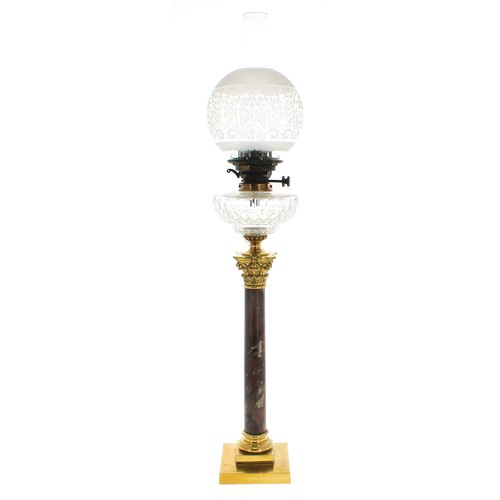 1114 - Good 19th century brass and marble Corinthian column oil lamp, the clear glass reservoir over a base... 