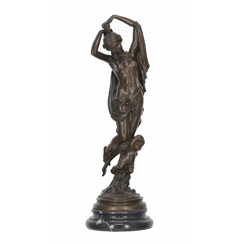 571 - After the antique - a French bronze figural study of a classical maiden with a putto figure at her f... 