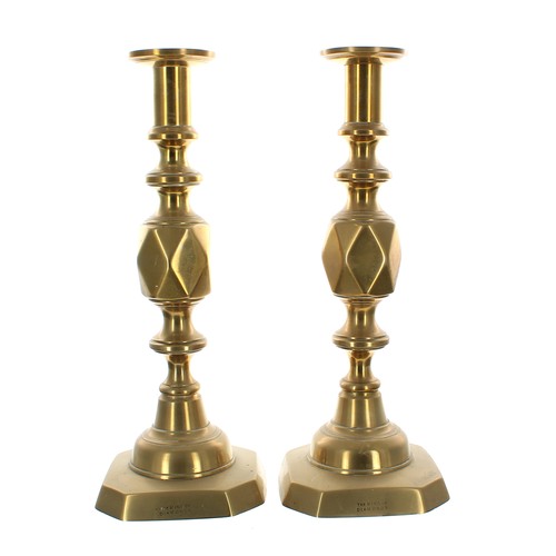 1123 - Pair of Victorian 'King of Diamonds' brass ejector candlesticks, stamped to the bases, 12