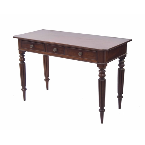 763 - Victorian mahogany writing table, the plain top over three short frieze drawers and raised upon turn... 