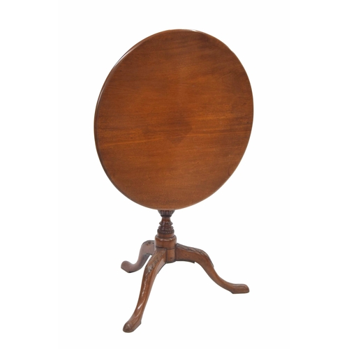 774 - George III mahogany tilt-top tripod occasional table, the tilt-top on a gadrooned central support on... 