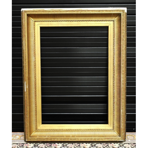 735 - Large ornate ribbed giltwood and gesso frame, 38