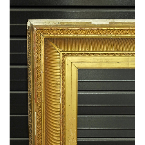 735 - Large ornate ribbed giltwood and gesso frame, 38