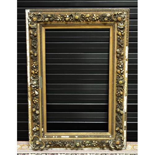 736 - Large ornate giltwood and gesso frame, 35