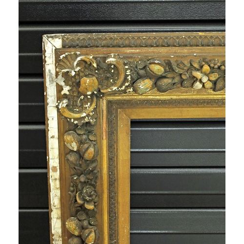 736 - Large ornate giltwood and gesso frame, 35