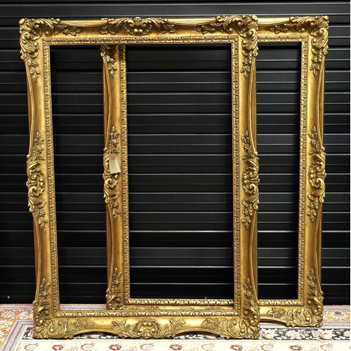 738 - Good pair of large ornate Florentine giltwood and gesso frames, 40