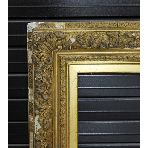 739 - Large ornate giltwood and gesso frame, 39