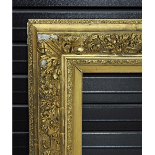 740 - Large ornate giltwood and gesso frame, 36