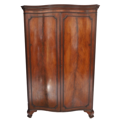 782 - 19th century French mahogany bow-fronted wardrobe, the carved key cornice over two long shaped panel... 