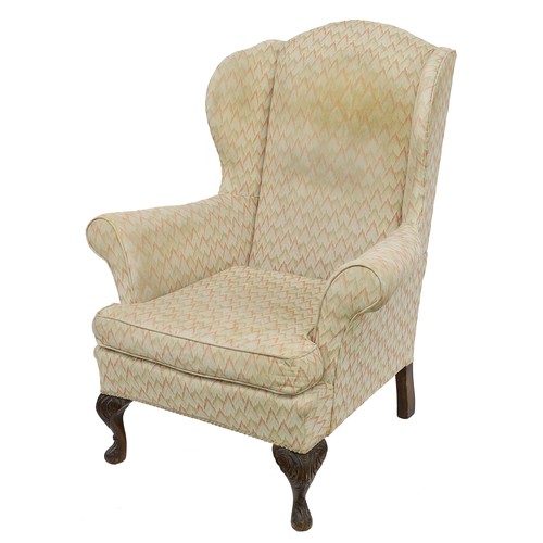 776 - Georgian Chippendale style wing armchair, on scroll carved front cabriole legs, 35