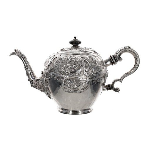 504 - George II Scottish provincial silver teapot, the hinged cover with hardwood finial, the body cast in... 