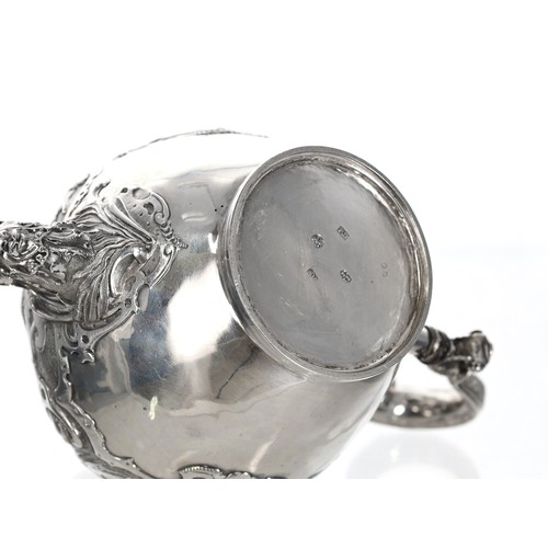 504 - George II Scottish provincial silver teapot, the hinged cover with hardwood finial, the body cast in... 