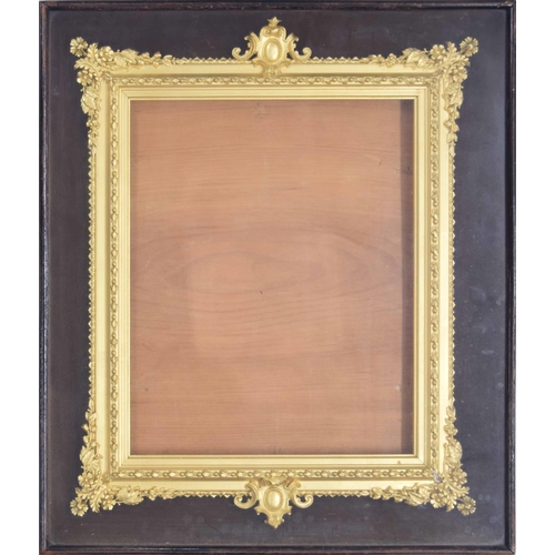 741 - Attractive gilt gesso frame, mounted in a glazed box frame on cushion mount, 16