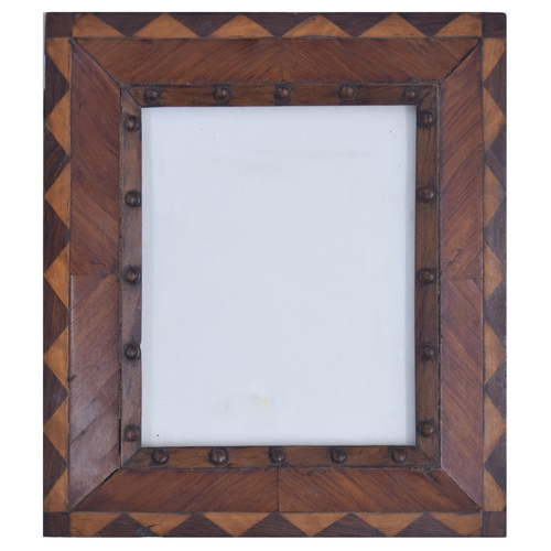 742 - Tramp Art parquetry picture frame, glazed, 13