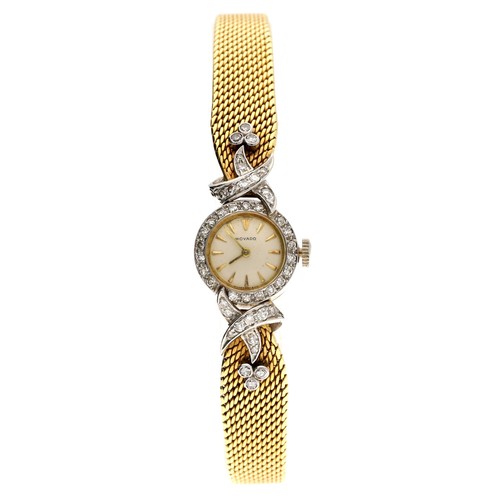 19 - Movado 18ct yellow gold diamond set lady's wristwatch, signed silvered dial, 29.2gm, 15mm, 7.5