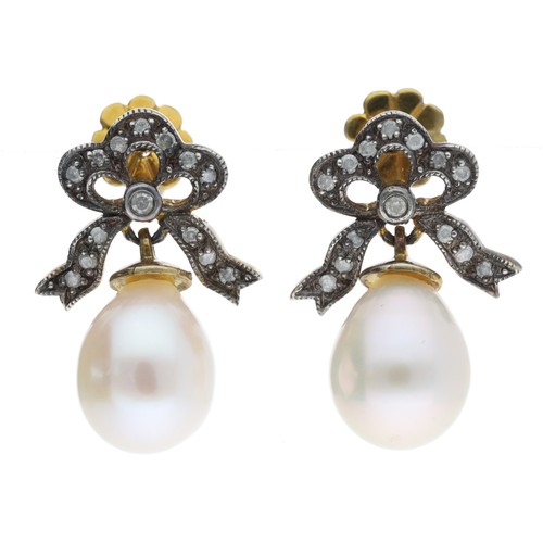 85 - Pair of cultured pearl and diamond bow design earrings, round brilliant-cut, the pearls  8mm, post a... 