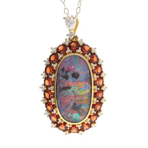 125 - Attractive boulder opal, diamond and gen set oval pendant on a slender 18ct necklace, the opal 4.14c... 