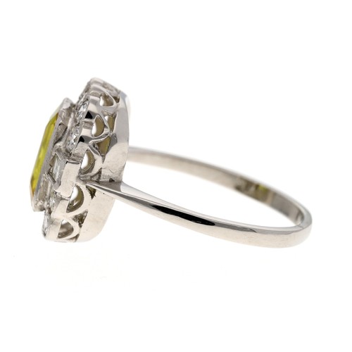 102 - Attractive platinum yellow sapphire and diamond cluster ring, the sapphire 2.20ct approx, with bague... 