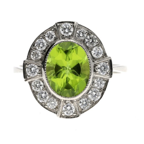 142 - Platinum peridot and diamond oval cluster ring, the peridot 1.70ct approx, round brilliant-cut diamo... 