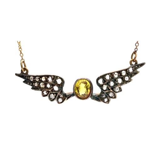 192 - Attractive yellow sapphire and diamond set 'wings' pendant, set in silver on an 18ct fine necklace, ... 