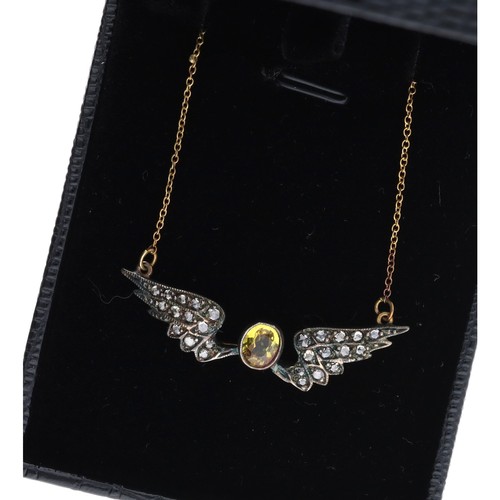 192 - Attractive yellow sapphire and diamond set 'wings' pendant, set in silver on an 18ct fine necklace, ... 