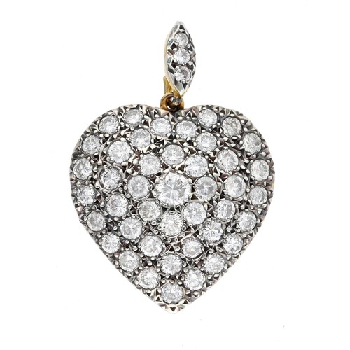 202 - Attractive pavé diamond set silver and 9ct gold heart shaped pendant, round brilliant-cut diamonds e... 