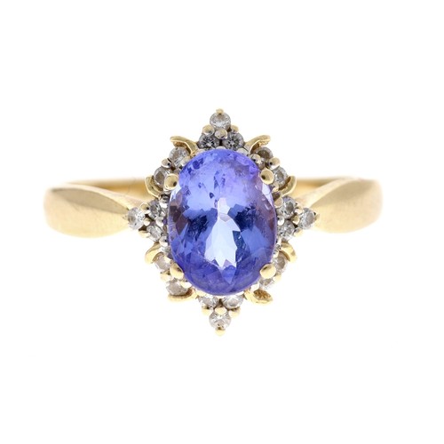 96 - Attractive 18ct tanzanite and diamond oval cluster ring, the tanzanite 1.20ct approx, round brillian... 