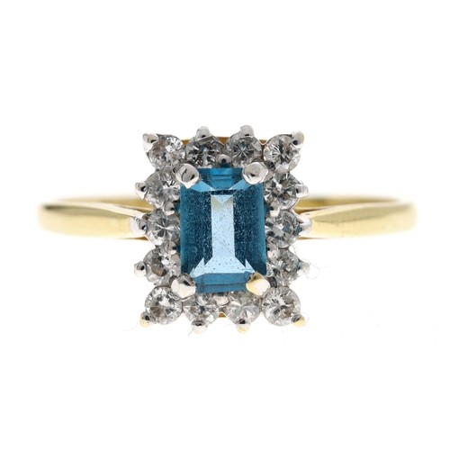 206 - 18ct blue topaz and diamond cluster ring, the topaz 0.50ct approx, round brilliant-cut diamonds, wid... 