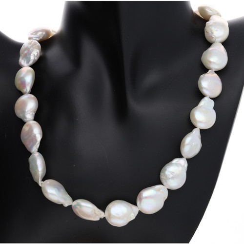 94 - Baroque pearl necklace with brushed gold-plated and silver hinged hoop clasp, 88.9gm... 