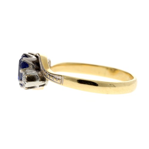 69 - 18ct yellow gold sapphire and diamond twist design three stone ring, the oval sapphire 0.50ct approx... 