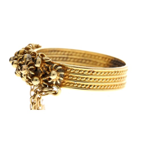 119 - Yellow metal chain ring with a key and charm attachment, 3.2gm, ring size J/K