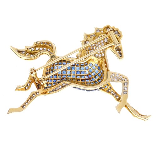 129 - Fine quality 18ct yellow gold pavé set horse design brooch, the body with calibrated sapphires with ... 