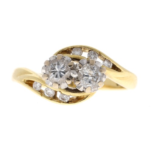 199 - 18ct yellow gold twist design diamond set ring, round brilliant-cuts, 0.78ct approx in total, width ... 