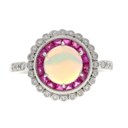 63 - Attractive platinum cabouchon opal, ruby and diamond circular cluster ring with set shoulders, 13mm ... 