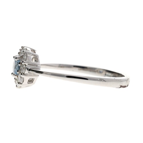 133 - Attractive 18ct white gold aquamarine and diamond circular cluster ring, the aquamarine 0.25ct appro... 