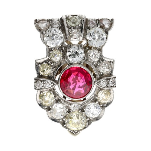 88 - Attractive Art Deco white metal ruby and  diamond clip brooch, the round ruby 1.00ct approx, in a mi... 