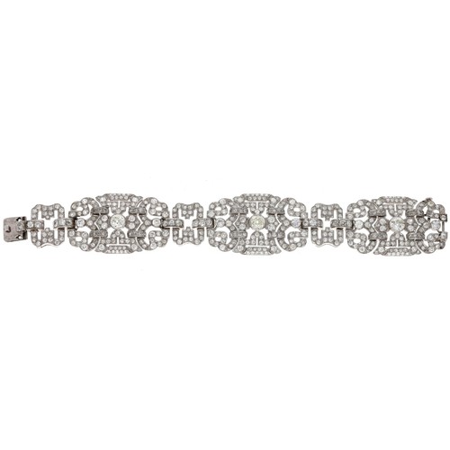 234 - Fine and impressive Art Deo platinum diamond set bracelet, composed of three three large oval pierce... 