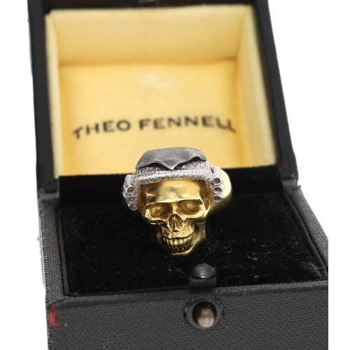 77 - Theo Fennel 18ct 'lawyer skull' design ring, London 2010, signed 'FENNELL', 29.2gm, width 22mm, ring... 