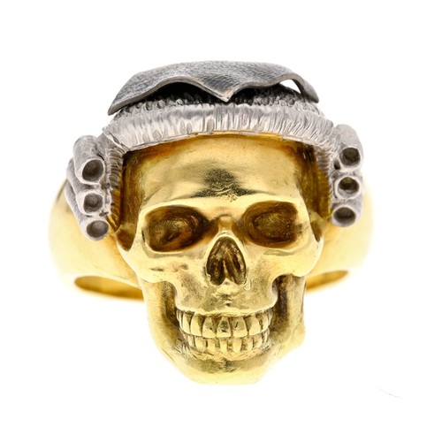 77 - Theo Fennel 18ct 'lawyer skull' design ring, London 2010, signed 'FENNELL', 29.2gm, width 22mm, ring... 