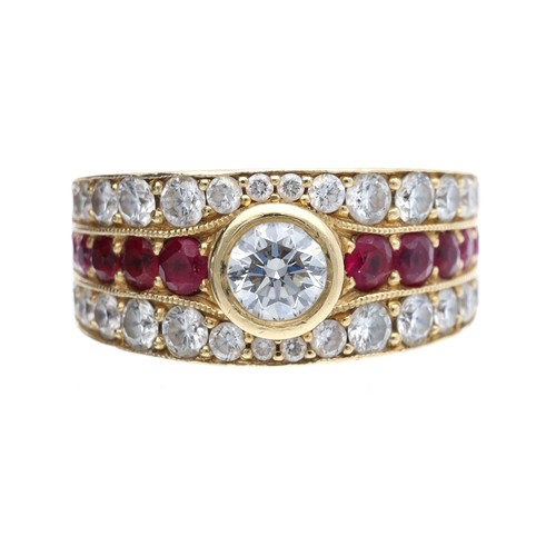 87 - Attractive bespoke 18ct yellow gold ruby and diamond dress ring, with a centre round brilliant-cut d... 