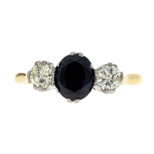 107 - 18ct yellow gold sapphire and diamond three stone ring, the centred oval sapphire 0.75ct approx, wit... 