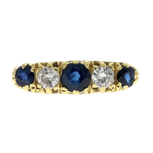 136 - Attractive 18ct yellow gold sapphire and diamond five stone ring in a scroll setting, with three rou... 