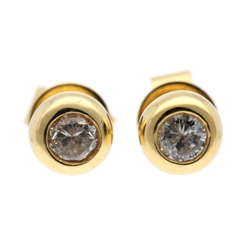 201 - Pair of 18ct yellow gold diamond stud earrings, round brilliant-cuts in a rub-over setting, 0.30ct a... 