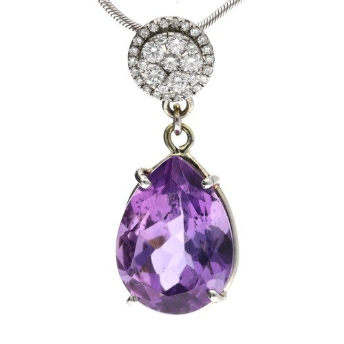 205 - Attractive platinum amethyst and diamond set pendant on a slender necklace, with a round brilliant-c... 