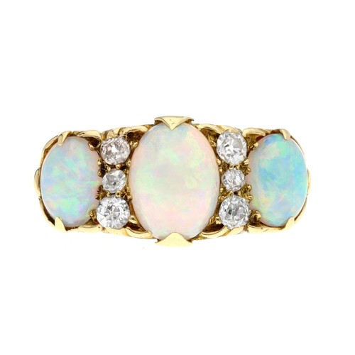 214 - Attractive Edwardian 18ct opal and diamond ring, Birmingham 1902, with three oval opal cabochon's se... 