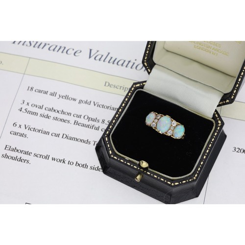 214 - Attractive Edwardian 18ct opal and diamond ring, Birmingham 1902, with three oval opal cabochon's se... 