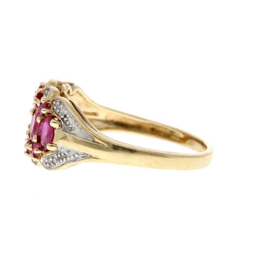 215 - Ruby and diamond 9ct yellow gold dress ring, width 12mm, 3.2gm, ring size Q